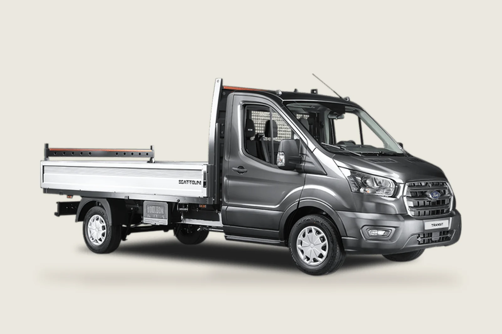 Grey Ford Transit with a flatbed