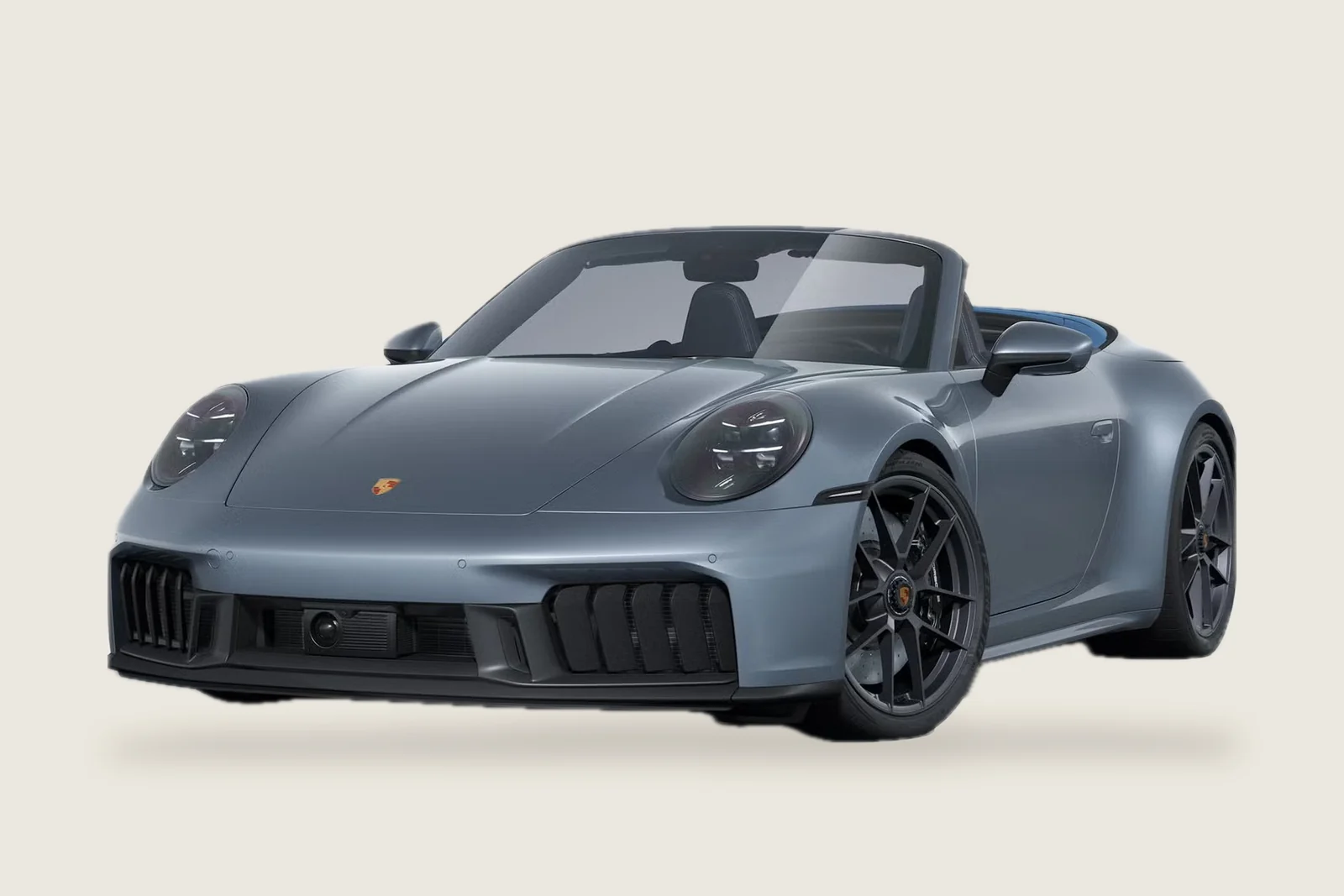 Grey Porsche 911 Carrera 4 GTS Cabriolet with the roof closed seen from the side
